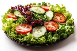 A salad with tomatoes, cucumbers and lettuce photo