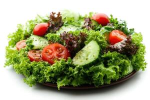 A plate of salad with tomatoes, cucumbers and lettuce photo