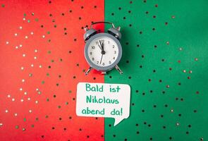 Clock is on a green background with a red background photo
