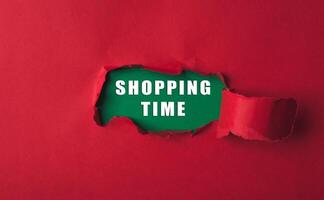 Red background with a green word that says shopping time photo