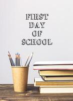 Stack of books with the words First Day of School photo