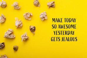 Yellow background with a bunch of crumpled paper on it photo