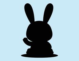 a black and white silhouette of a rabbit vector