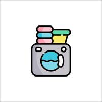 A washing machine icon with a stack of laundry vector