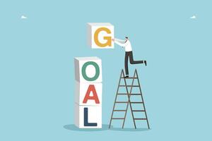 Man builds word goal from cubes vector