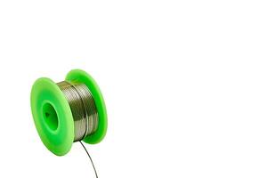 Green Spool with wound solder for soldering, wire photo