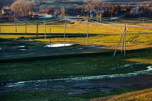 Beautiful landscape with quiet rural life of winter without snow in Moldova photo