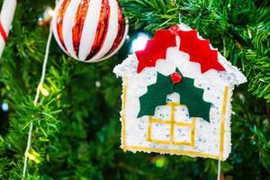 Luxurious Golden Christmas Tree Adorned with Sparkling Ornaments for the Holidays photo