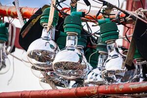 Fishing Bulbs Hanging on Wooden Structures with Colorful Details in a Thai Port at Chonburi, Thailand. photo