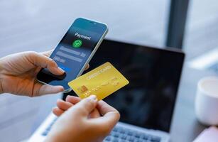 Online banking transaction concept, Woman with credit card using smart phone and shopping online, Ecommerce and secure mobile banking concept, Making online payments. photo