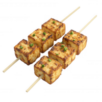 Grilled skewers of tofu garnished with herbs, a delicious vegetarian option. png