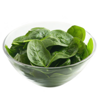 Fresh spinach leaves in a clear glass bowl, ideal for healthy cuisine and salads. png