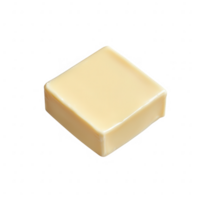 un liso, cremoso cuadrado de mantequilla desplegado en un limpiar superficie. png