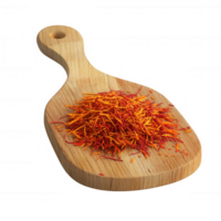 A vibrant pile of saffron strands on a wooden cutting board, highlighting culinary artistry. png