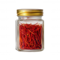 A jar of vibrant saffron strands, known for its unique flavor and color. png