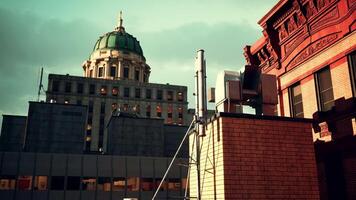 A tall building with a green dome on top of it video