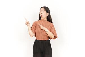 Showing Product and Pointing Side Of Beautiful Asian Woman Isolated On White Background photo