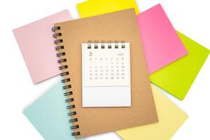Simple desk calendar for AUGUST 2025 with Sticky note. Calendar concept with copy space. 2025 AUG calendar. photo