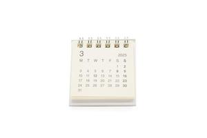 Simple desk calendar for MARCH 2025 isolated on white background. Calendar concept with copy space. 2025 MAR calendar. photo