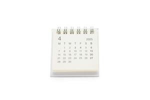 Simple desk calendar for APRIL 2025 isolated on white background. Calendar concept with copy space. 2025 APR calendar. photo