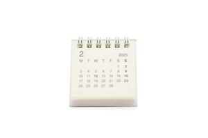 Simple desk calendar for FEBRUARY 2025 isolated on white background. Calendar concept with copy space. 2025 FEB calendar. photo
