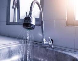 The concept of saving water in the household photo