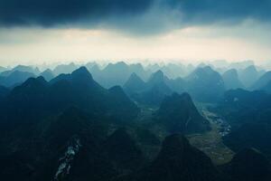 Sunlight shining over stacked mountain range on remote wilderness in countryside at Vietnam photo