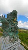 Cinematic FPV shot of Garuda Wisnu Kencana Statue in Bali, Indonesia. video