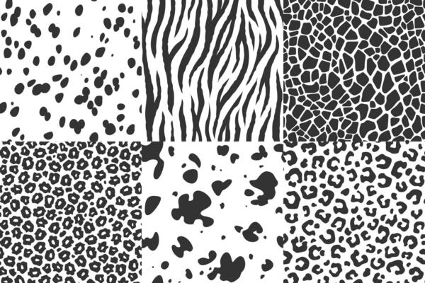 A collection of black and white animal skin seamless patterns. Dalmatian fur, zebra stripes, giraffe, cow, leopard, cheetah or jaguar spots. Safari style textures for fashion, textiles, graphic design