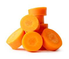 Fresh orange carrot slice in circle shape in pile isolated on white background with clipping path photo