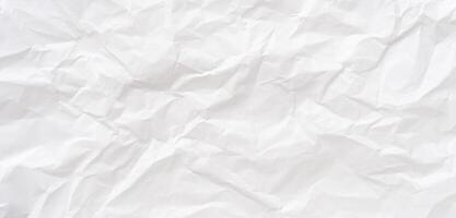 Wrinkled or crumpled white stencil paper texture used for wrinkled or crumpled white paper background texture in decorative art work Top view and full frame photo