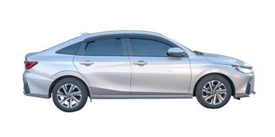 Side view of silver sedan car isolated on white background with clipping path photo