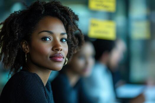 Woman leader sharing vision with colleagues in brainstorming session photo