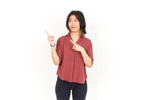 Showing Product and Pointing Side Of Beautiful Asian Woman Isolated On White Background photo