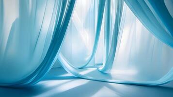 A blue curtain hangs in front of a white wall photo