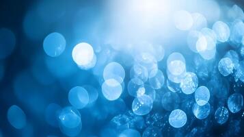 The image is a blue background with many small blue circles photo