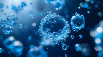 A blue background with many small bubbles of water photo