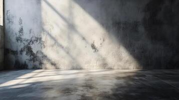 A large empty room with a wall that is covered in graffiti photo