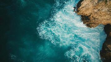 The ocean is calm and the waves are small photo