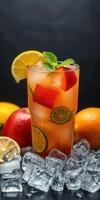 Refreshing fruit cocktail with citrus and berries served on ice photo