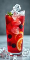 Refreshing summer berry drink with ice and citrus garnishes for a vibrant beverage photo