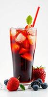 Refreshing berry beverage with ice cubes and mint leaf garnishing, perfect for summer enjoyment photo