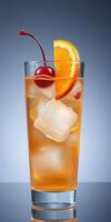 Refreshing cocktail garnished with cherry and orange slice served in a glass with ice cubes photo