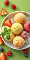 Colorful assortment of ice cream scoops served on a bed of ice with fresh berries during a summer gathering photo