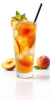 Refreshing peach iced tea served in a tall glass with fresh peach slices and mint leaves photo