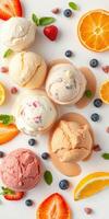 Delicious ice cream scoops arranged with fruits and toppings for a colorful dessert display photo