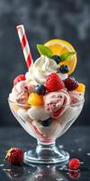 Delicious dessert featuring vibrant ice cream topped with fresh fruits and whipped cream on a wooden table photo