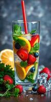 Refreshing fruit-infused beverage with colorful berries and citrus served in a tall glass on a wooden table photo