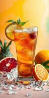 Refreshing summer beverage with fruits and ice on a colorful background photo
