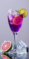 Vibrant cocktail with citrus garnishes served on ice in a stylish glass photo
